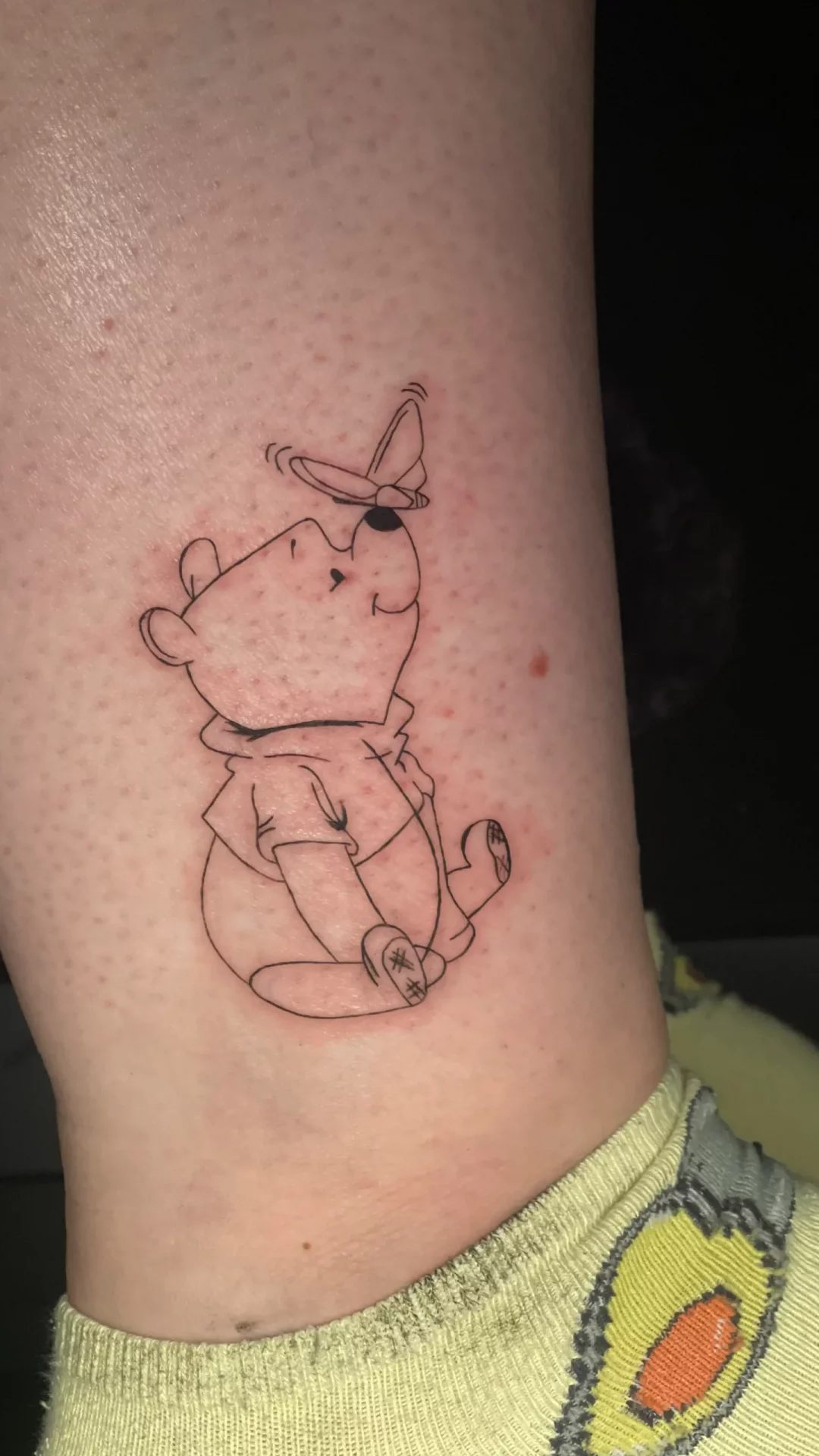 Winnie-the-Pooh-Tattoo im Fineline-Stil